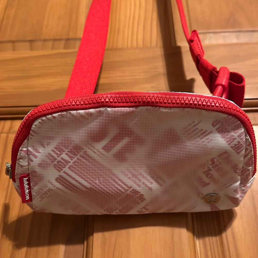 Brand new Lululemon belt bag in red and white print